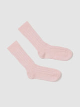 Pair of light pink socks on a white background
