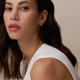 Orelia Polished Domed Mini Stud Earrings in Gold Orelia